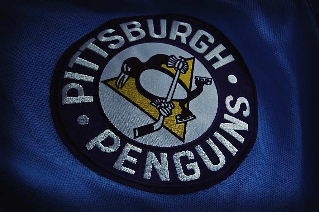 The Pittsburgh Penguins logo on a blue background