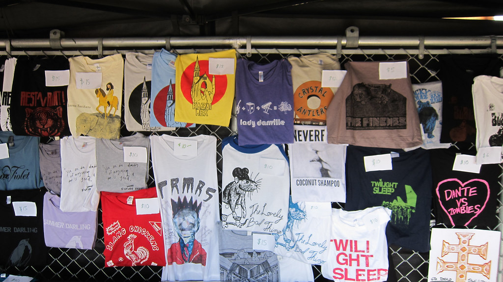 photo of the merch wall at a concert